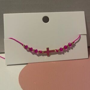 Cross Tie Bracelet in the color Barbie